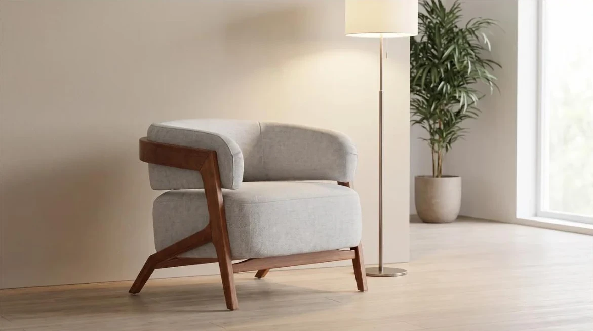 Poltrona de encosto envolvente no canto de leitura, com luminária e planta